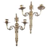 A pair of brass wall lights, 20th c, in Louis XVI style, polish residue