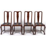 A set of four Queen Anne style mahogany stained beech dining chairs, c1930, with shaped top rails