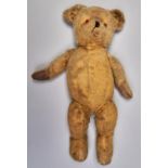 A blond mohair teddy bear, second quarter 20th c, 44cm h Worn