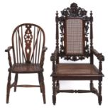 A Victorian carved oak armchair, with caned back and seat, seat height 42cm and an ash wheelback