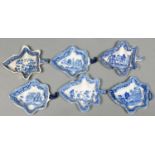 Six Spode and other contemporary blue printed earthenware leaf shaped pickle dishes, early 19th c,