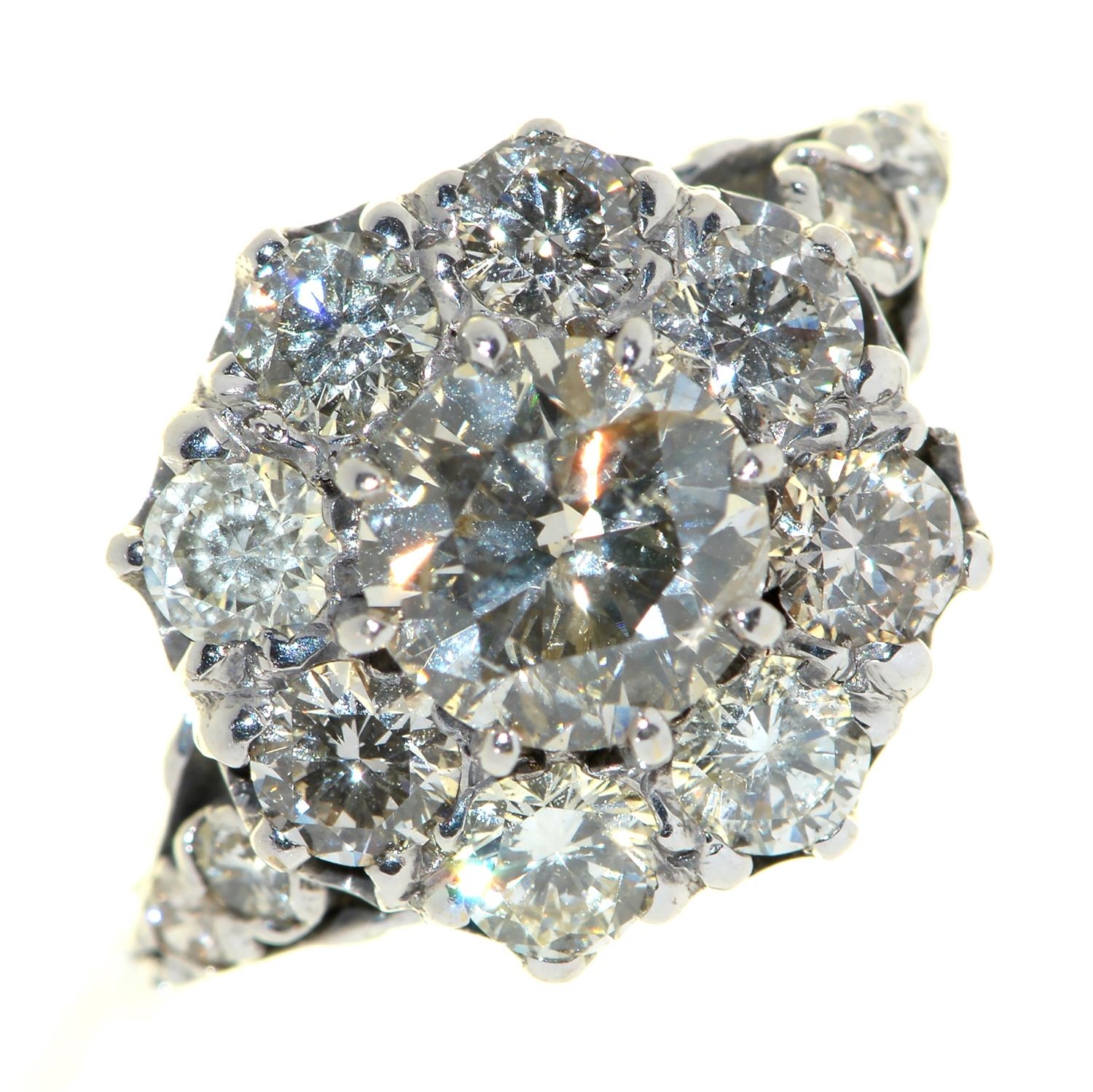 A diamond cluster ring,  with round brilliant cut diamonds weighing approx 2.85ct in total, in white