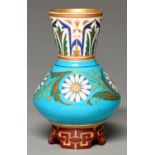 Dr Christopher Dresser. A Minton bone china vase, c1870, the vivid turquoise body and flared neck