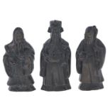 Three Chinese bronze figures of immortals, 19th / 20th c, 14 and 15cm h Good condition