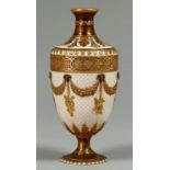 A Wedgwood gilt Queen's ware vase, c1890, of shield shape, one ornamented with trophies suspended