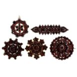 Four garnet brooches and a pendant, late 19th c, oblong brooch 54mm l, 32.6g All complete