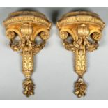 A pair of Victorian neo classical style giltwood and composition wall brackets,  late 19th c,  the