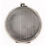 A George V silver compact, engine turned, a mirror to the underside of the lid, 52mm diam, by