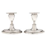 A pair of Edwardian silver dwarf navette shaped candlesticks, nozzles, 11cm h, by Thomas A Scott,