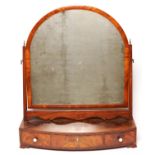 A Regency mahogany dressing table mirror, c1820, the arched plate within boxwood strung, cushion