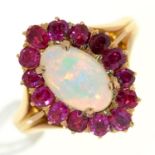 A ruby and opal cluster ring,  in gold, unmarked 4.6g, size M Stones of good colour and polish, very