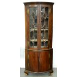 A mahogany standing corner cupboard in George III style, late 19th c, cavetto moulded cornice