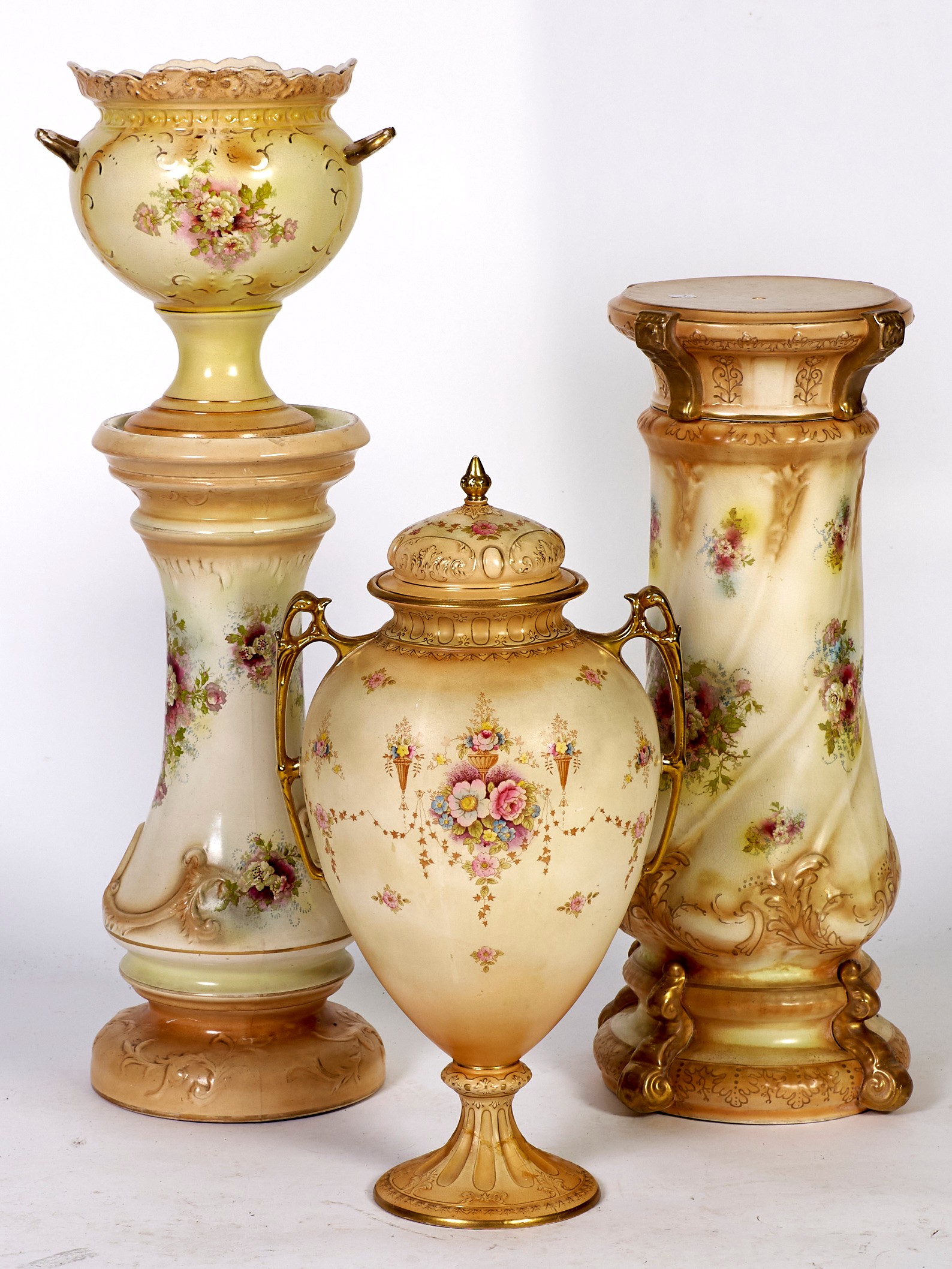 A Fielding's Royal Devon jardiniere pedestal, of spiral fluted baluster form, the body decorated