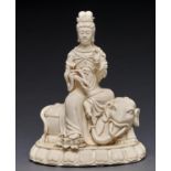 A Chinese blanc de chine figure of Guanyin seated on a recumbent elephant, 31.5cm h, commendation