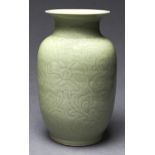 A Chinese celadon vase,  carved with   peony and  scrolling foliage, 29cm h Good condition