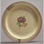 Clarice Cliff. An unusual A J Wilkinson plate, 1934, painted with a version of the tartan pattern,