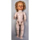 An English plastic clockwork character doll, mid 20th c, blond mohair wig, 51cm h Complete and