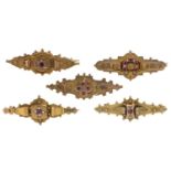 Five Victorian and early 20th c 9ct gold brooches, gem set, 45mm l and circa, Chester and