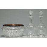 A pair of Edwardian 'brilliant' cut glass decanters and stoppers, c1910, with tri-lobed neck, 26cm h