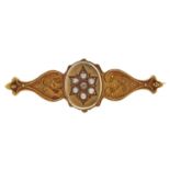 A Victorian old cut diamond and split pearl gypsy set 15ct gold bar brooch, Chester 1895, 4.4g