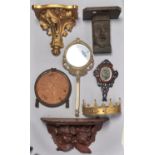 A gilt lacquered brass coronet shaped wall light frame, a giltwood wall bracket, a circular carved