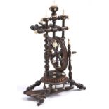 A German miniature turned beech and bone spinning wheel, late 19th c, peddle inscribed Strasbourg,