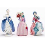 Three Royal Doulton bone china figures of young ladies, including Miss Demure and Spring Morning,