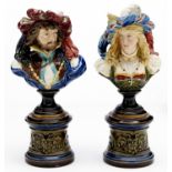A pair of Continental majolica busts of a nobleman and lady, c1890, in 16th c style, on pedestal, 24