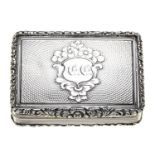 A Victorian silver vinaigrette with unusual grille, engine turned within chased borders, the lid