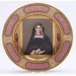 A Vienna style porcelain cabinet plate, c1900, painted with a portrait of Queen Catherine of Aragon,