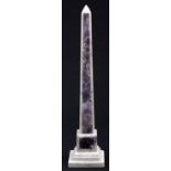 A marble and amethystine quartz obelisk, in late 18th c style, 38.5cm h Minor repairs to round base
