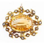 An Edwardian citrine and split pearl brooch, in 9ct gold, Birmingham 1907, 5.4g Good condition