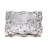 A Victorian silver vinaigrette, the lid engraved with a castle by a lake before sunrays, the