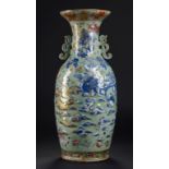 A Canton moulded celadon ground famille rose vase, mid 19th c, with turquoise and gilt dragon