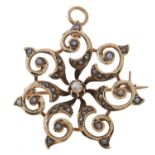 A split pearl openwork brooch-pendant, in gold marked 10ct, 4.8g Good condition