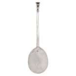 A Commonwealth silver seal top spoon, the fig shaped bowl on tapered stem with leafy terminal having