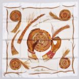 Fashion Accessories.  A Hermes printed silk scarf (boxed)