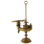 A German brass oil lamp, Wild & Wessel, Berlin, with maker's Kosmos burner, 55cm h, lead weight,