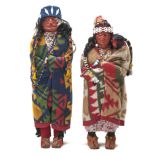 Two Skookum native American dolls, c1920, in original costume, the moccasins of suede applied to