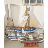 Three wooden model sailing and other boats, 74cm l and smaller (3) Generally good