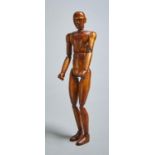 A wooden artist's lay figure,  20th c, rich golden varnish, 35cm Complete and in good condition. Not