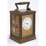 A French brass carriage clock,  with gilt ground porcelain panels, c1900, the enamel dial with