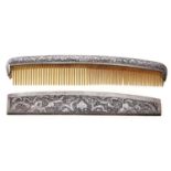 A Middle Eastern silver hair comb and sheath, c1930, intricately engraved to both sides, 15.5cm Good