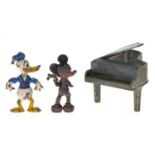 Two Salco painted alloy figures of Mickey Mouse and Donald Duck, 50mm and c and a similar