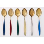 Georg Jensen. A set of six Danish silver gilt and harlequin guilloche enamel coffee spoons, maker'