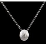 A diamond pendant, in frosted white gold, marked 750, sliding on white gold necklet, marked 750,
