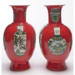 A pair of Chinese coral red ground famille verte vases, 20th c, 38.5cm h, Yongzheng mark within