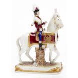 A German porcelain figure of a Napoleonic cavalryman of the Garde Imperiale, c1975, 28cm h,