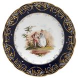 A Continental cobalt bordered cabinet plate, c1900, painted with a watteau esque scene and gilt with