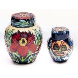 A Moorcroft Tree Peony ginger jar and cover and a smaller Moorcroft ginger jar and cover, early 21st